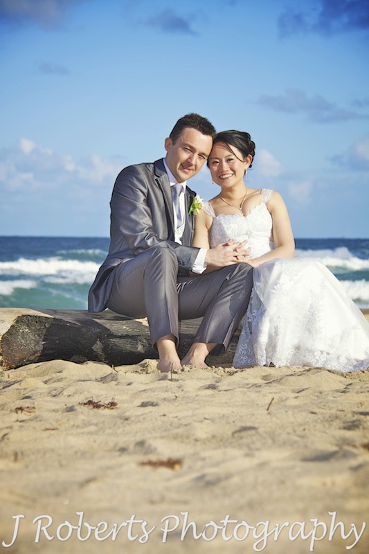 Smiling at the beach - wedding photography sydney